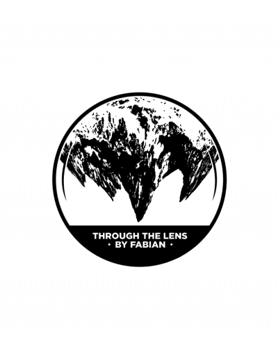 Logo depicting a mountain in a lens. Text in the logo says "Through the lens, By Fabian".